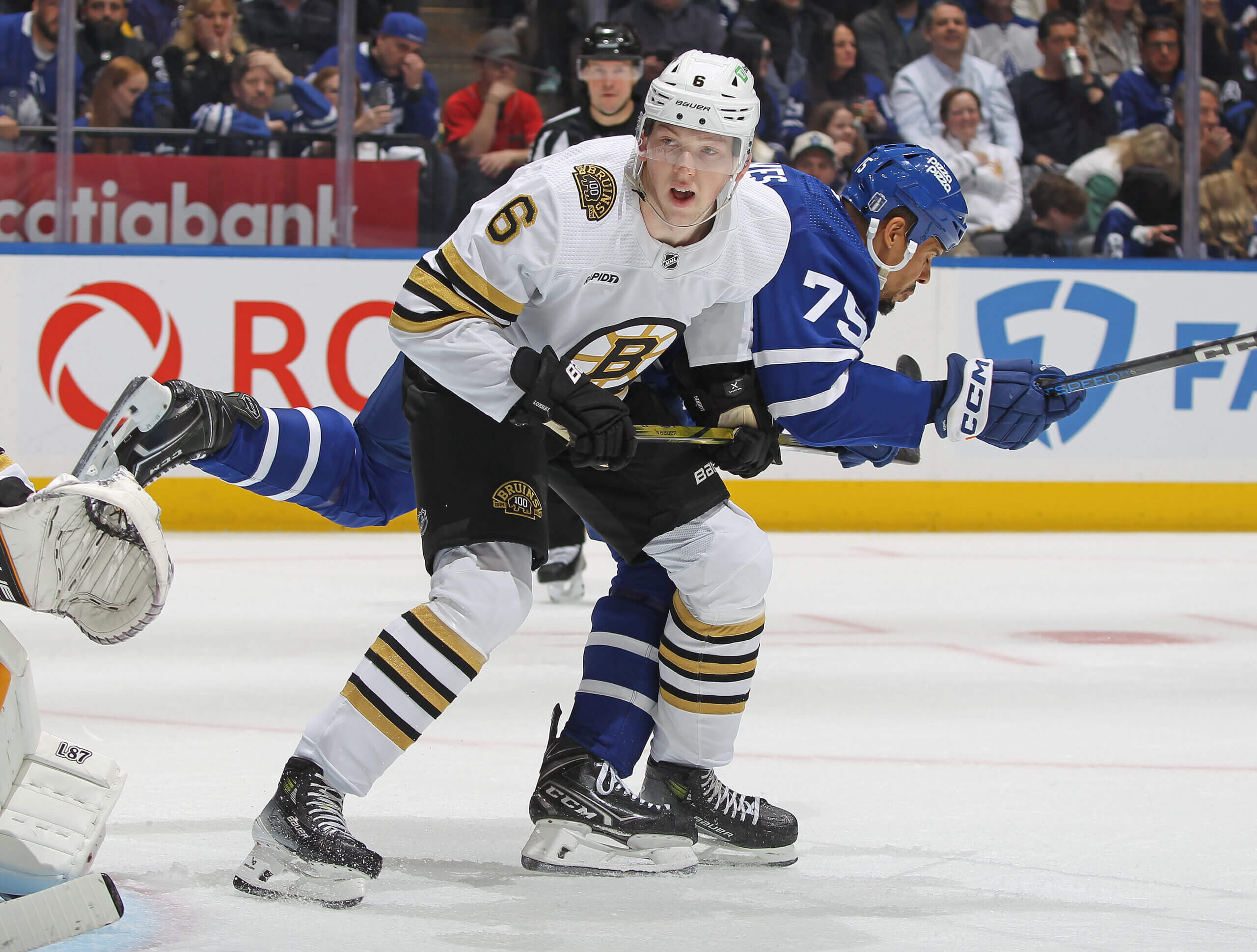 Bruins’ Mason Lohrei, Matt Grzelcyk and a defense in transition