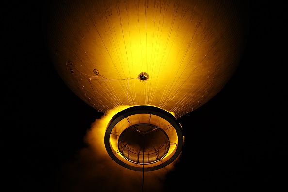 Take off: Mathieu Lehanneur’s Olympic Cauldron rises into the Parisian night sky