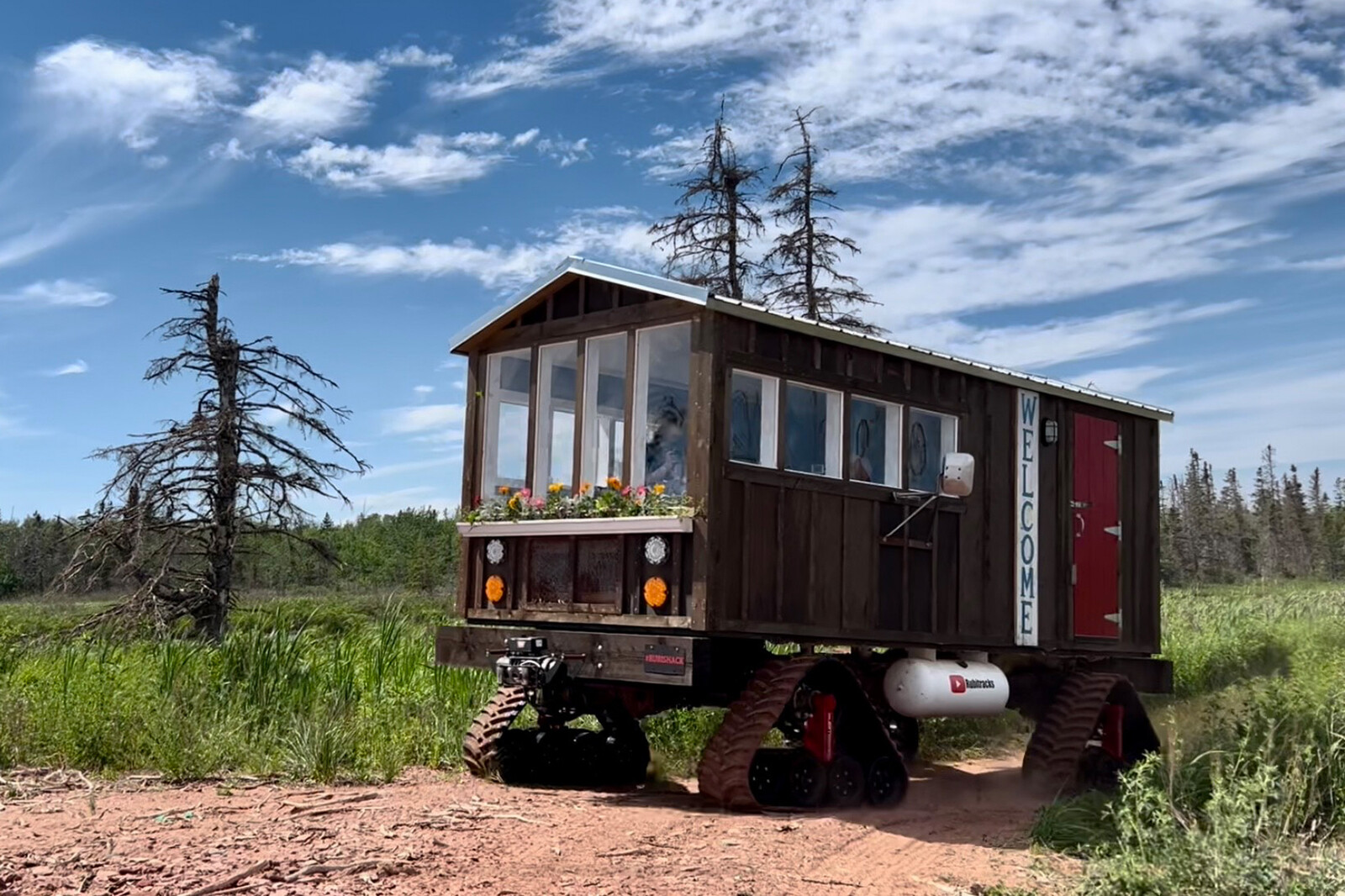 A Tiny Cabin Atop a Pickup Truck Can Handle Snow, Hills, and Seashore